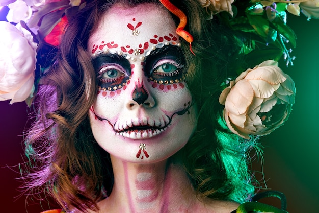 Halloween make up sugar skull beautiful model.