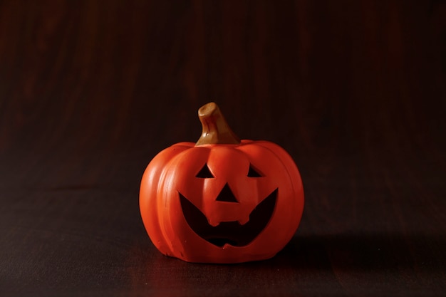 Halloween-pompoen op oude houten achtergrond