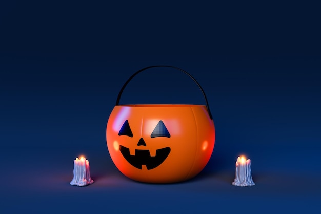 Хэллоуинская корзина из тыквы с горящими свечами по бокам на темном фоне. Концепция трюка или лакомства.