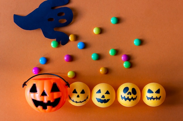 Halloween pumpkin bucket with candies