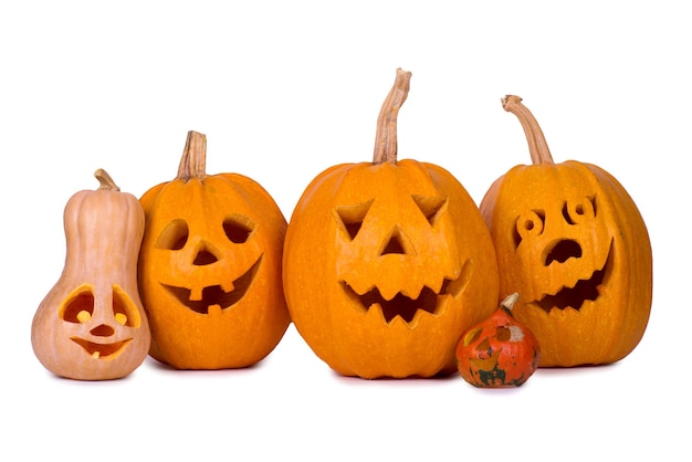 Halloween pumpkin, five funny faces, isolated on white.