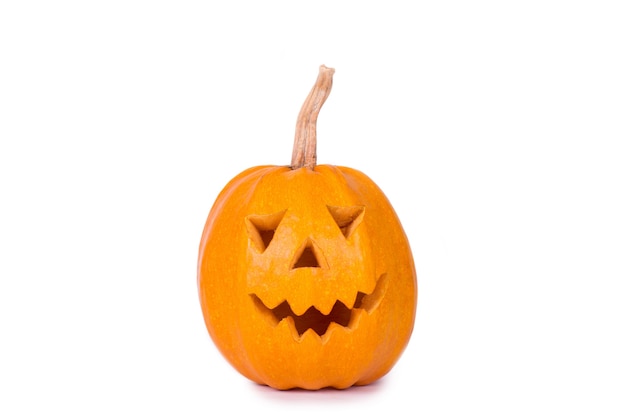 Halloween pumpkin, funny face isolated on white.