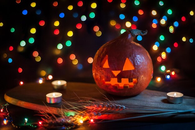 Halloween Pumpkin Glowing On A Dark Background Lights