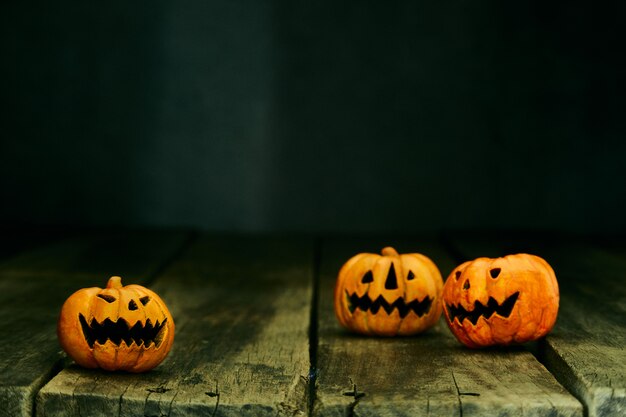 Photo halloween pumpkin head jack lantern on  table