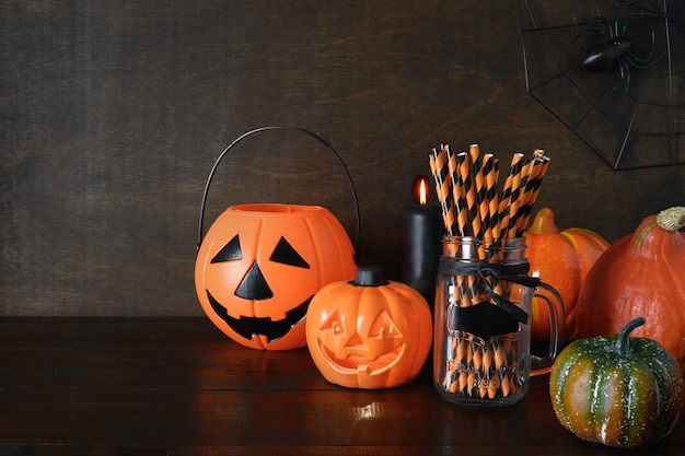 Halloween pumpkin head jackolantern on dark background