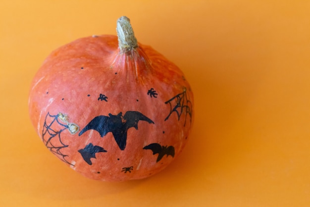 halloween pumpkin isolated on an orange background