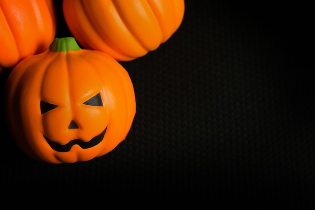 The halloween pumpkin jack in black holiday background image.