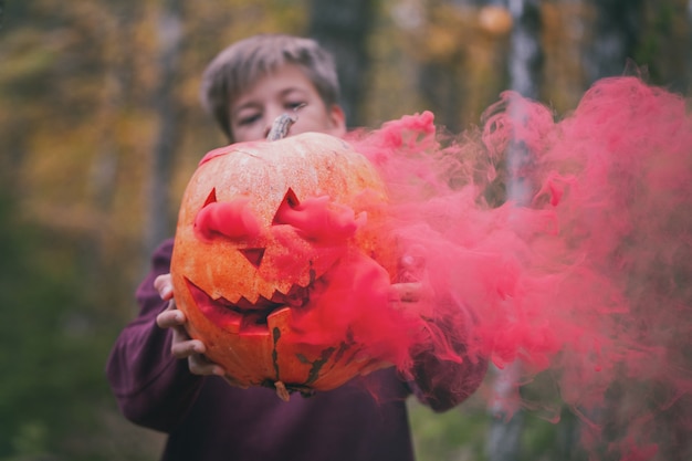 Halloween pumpkin jack o lantern decor with scary faces.