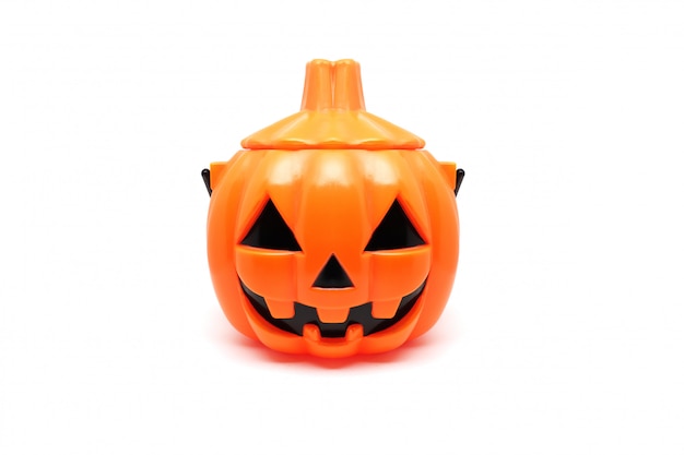 Photo halloween pumpkin toy isolated on white.