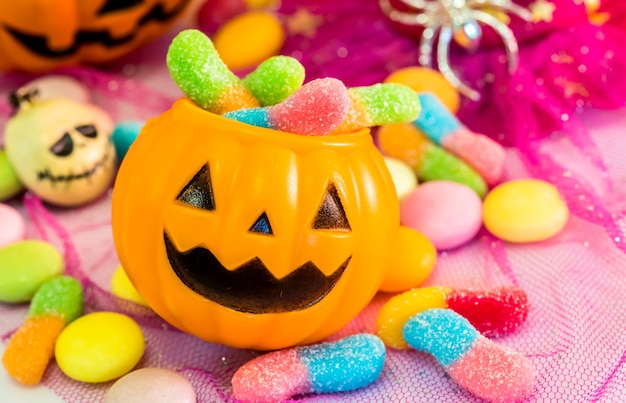 Halloween pumpkin, trick or treat with sweet candy