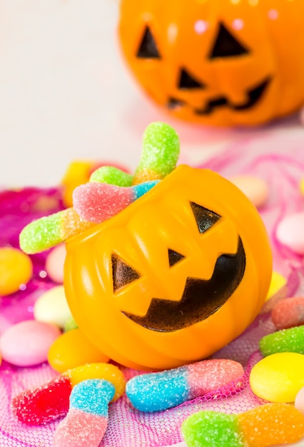 Halloween pumpkin, trick or treat with sweet candy