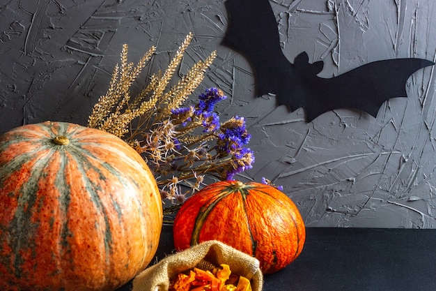 Halloween pumpkin with candy bats