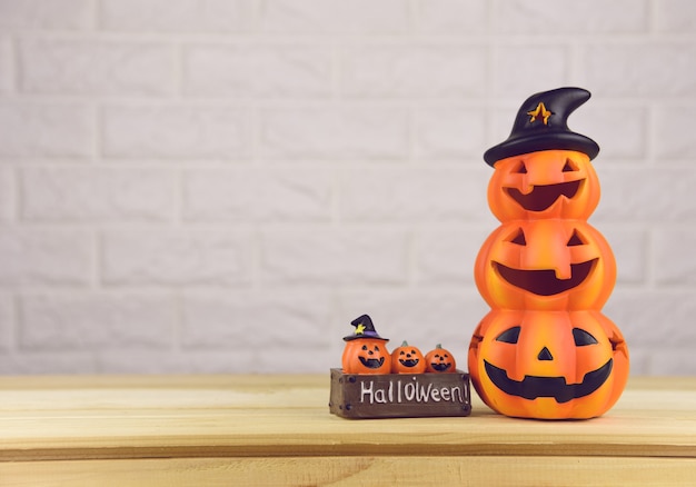 Halloween pumpkin on the wood table 