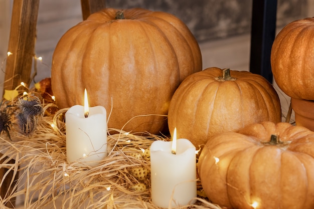 Halloween Pumpkins with candles straw