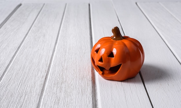 Photo halloween pumpkins on wooden floor background