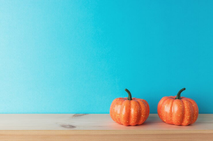 Halloween pumpkins on a wooden table