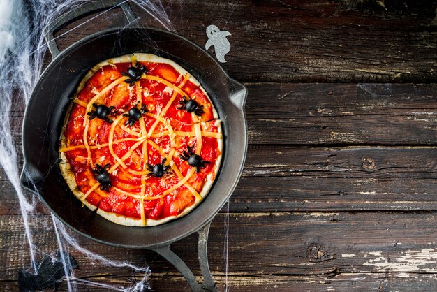 Halloween spiderweb pizza