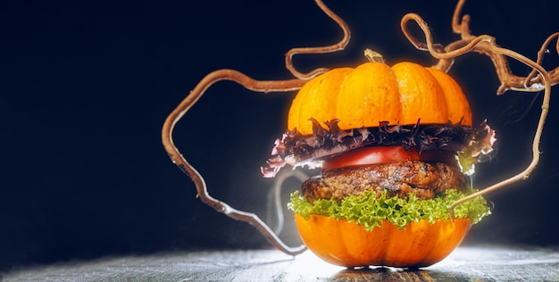 Halloween tasty burger on dark background