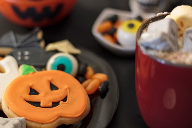 Photo halloween treats and snacks on table