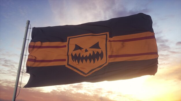 Halloween vlag zwaaien in de wind, lucht en zon achtergrond. 3d-rendering