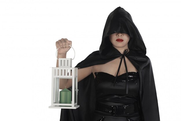 Хэллоуин ведьмы женщина держит фонарь