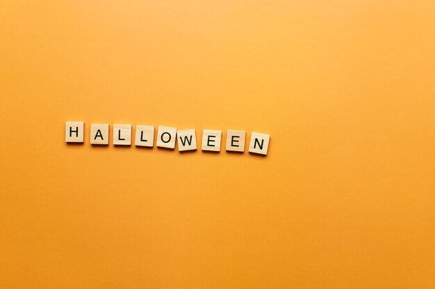 Halloween word on orange background