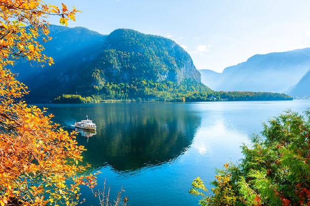 Hallstatter lake in Alps mountains at sunrise, Austria. Beautiful autumn landscape