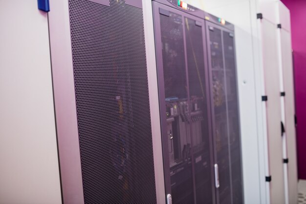 Hallway with a row of servers