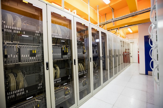 Hallway with a row of servers