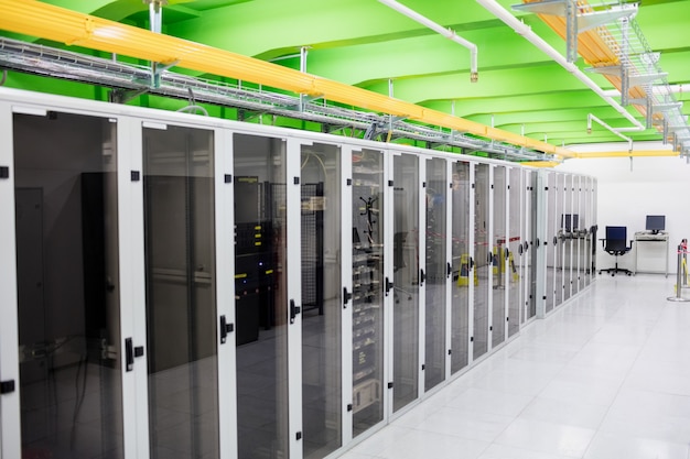 Hallway with a row of servers