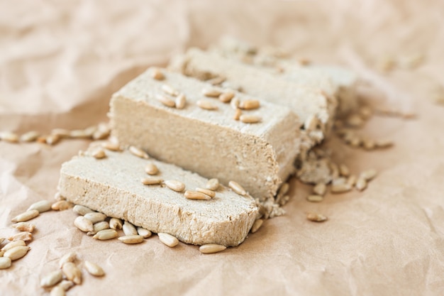 Halva pieces with sunflower seeds closeup turkish dessert