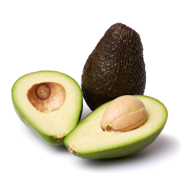 Halved avocado with seed isolated