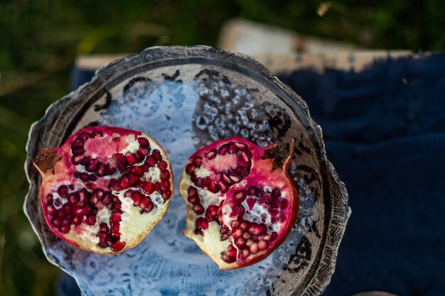 Halved pomegranate on a beautiful plate