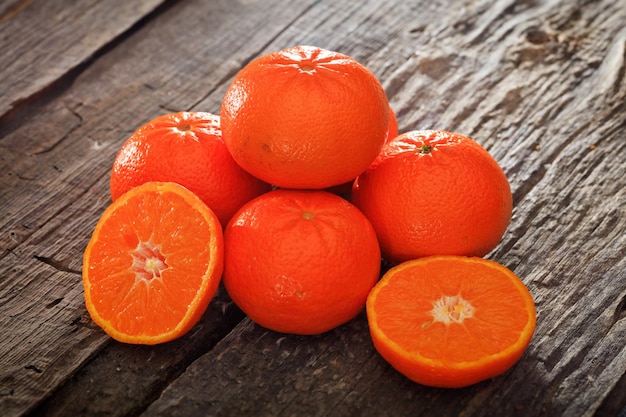 Halved and whole tangerines