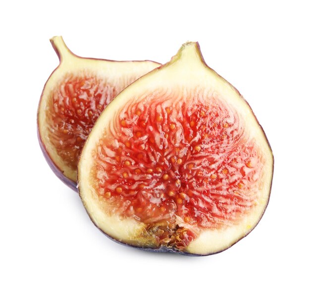 Halves of fresh fig fruit on white background