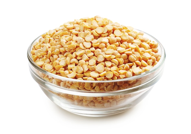 Halves peas in a glass bowl on a white background