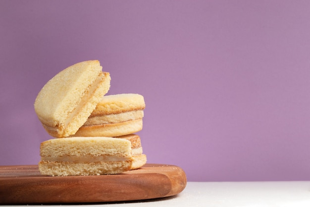 Halves and whole alfajor with dulce de leche.