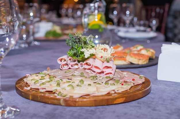 Ham and cheese rolls on a plate Delicious appetizer meat carbonate and cream cheese.Appetizer