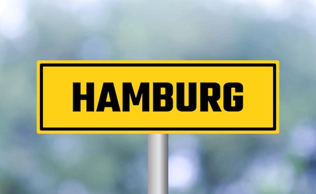 Hamburg road sign on blur background