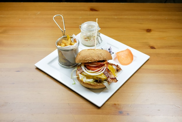 Hamburger and fries on a table