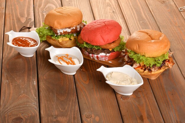 a hamburger is a sandwich consisting of one or more cooked patties of ground meat
