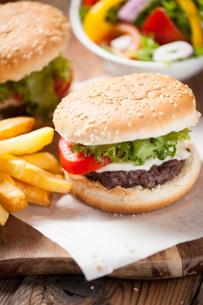 Hamburger, potato fries, cola drink. Takeaway food