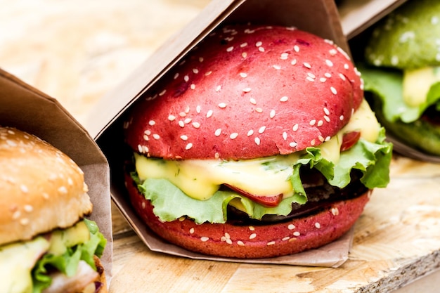 Hamburger with bright bun close-up