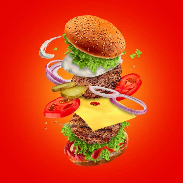 Hamburger with flying ingredients