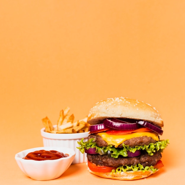 Photo hamburger with french fries and ketchup