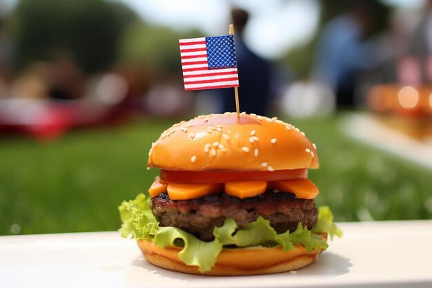 Foto un hamburger con una piccola bandiera americana sopra