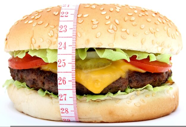 a hamburger with a tape measure around it is shown.