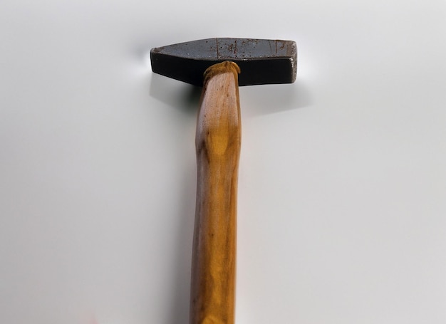 Hammer on white surface