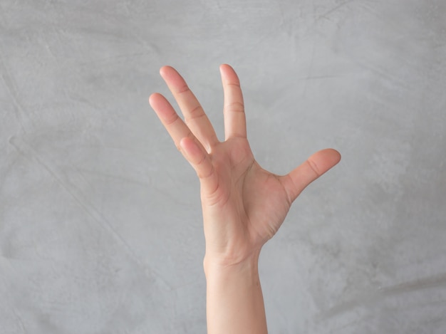 Hand action gesture on grey background