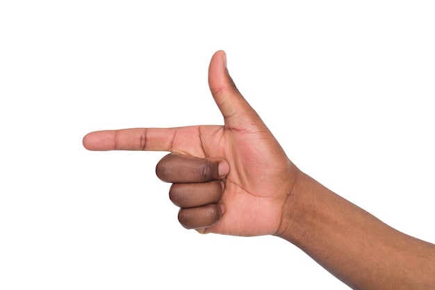 Hand of african american, index finger points forward on isolated white background. Copy space